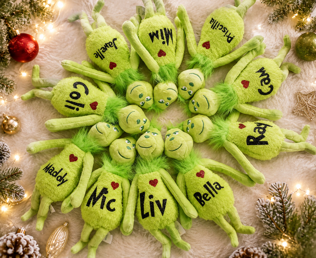 Personalized green Christmas plush held in hand